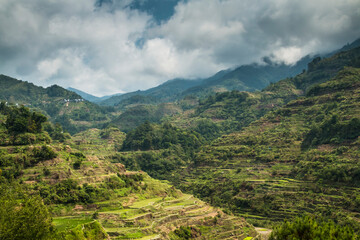 Fototapeta na wymiar dramatic rice terraces landscape taken in Batad, Banaue, Philippines during a summer travel in Asia