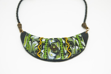 Ethnic style green black necklace of polymer clay.