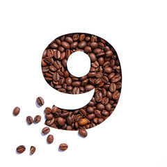 Number nine made of coffee beans and paper cut in shape of ninth numeral isolated on white....