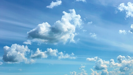 Beautiful blue sky with white clouds as a natural background.
