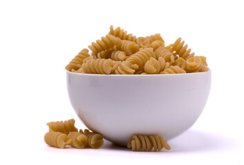 Bowl filled with rigatoni isolated on a white background