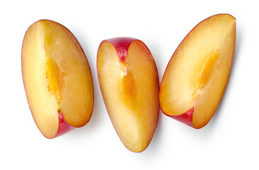 Slices of fresh ripe plum isolated on white background