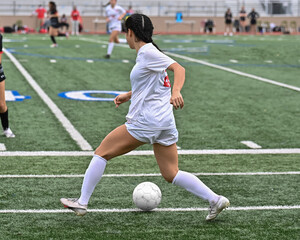 High school girls competing in a soccer match in south Texas