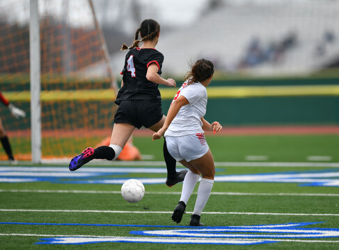 High school girls competing in a soccer match in south Texas