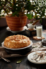 Kurnik is a national Russian dish, Pie made of pancakes, chicken, mushrooms and puff pastry. © Savory