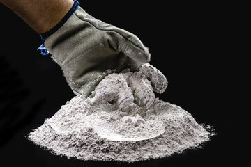 zinc oxide, white powder with hand preparing the compound