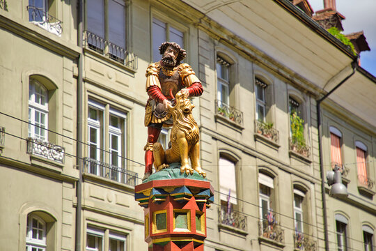 Bern, Switzerland - Aug 23, 2020: close up of Fountain statue of Samson killing lion. Simsonbrunnen statue of Bern in Kramgasse street.