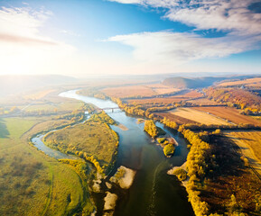 Fototapeta na wymiar Aerial top view of winding river in sunny day. Dniestr canyon, Ukraine, Europe.