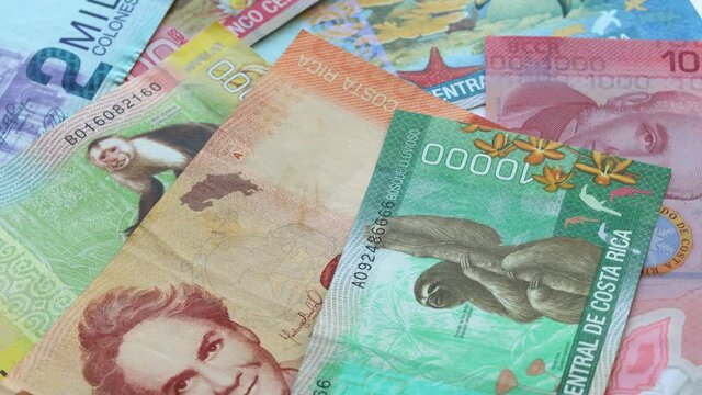 Costa Rican currency. Various money, slowly rotating on its own axis 