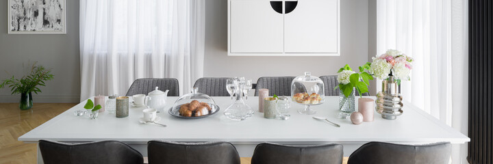 Stylish decorated dining table, panorama