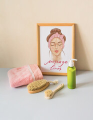 Massage brush for the body. Dry lymphatic drainage massage. Wooden brush made of cactus and boar fiber. Scheme of massage lines of the face in a wooden frame.