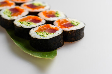 Overhead japanese sushi food. Maki ands rolls with tuna, salmon, shrimp, crab and avocado. Top view of assorted sushi, all you can eat menu.