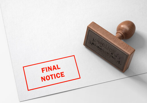 Rubber stamp with red " Final notice " stamp on paper
