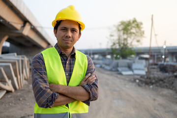 Portrait young asian construction worker in construction site
