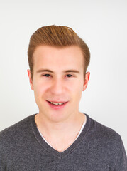 portrait of cute teenage boy with red hair