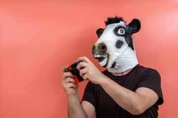 person disguised as a cow playing a video game