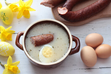 Sour rye soup with sausage and egg