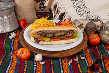 Meatballs baked between roasted bread