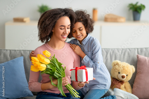 Black girl celebrating mother's day, greeting mum