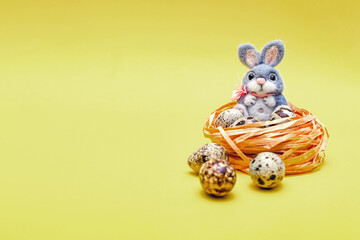 Postcard for Easter. Blank for a postcard with a place to insert text. Easter plush bunny and quail...