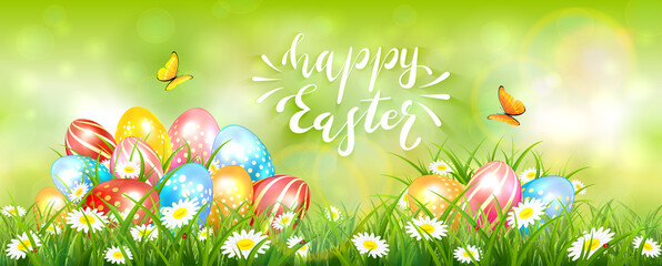 Green Easter Background with Colorful Eggs