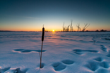 Sunrise over the frozen river © Krzysztof