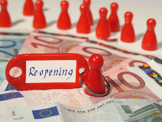 some game figures on a monetary background