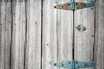blank background of rustic wood  planks and  rusty door hinges