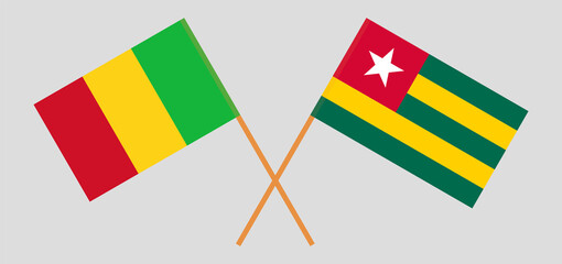 Crossed flags of Mali and Togo. Official colors. Correct proportion