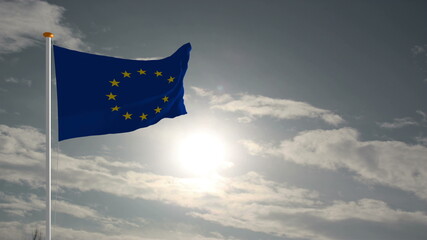 EU Flag waving against clouds