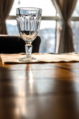 Empty wine glasses are on the table in the restaurant.