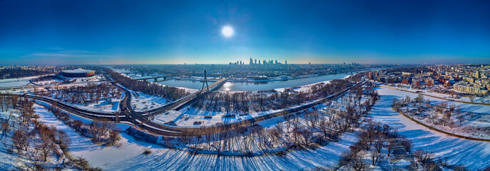 Beautiful panoramic winter aerial drone view to Warsaw city center with skyscrapers and...