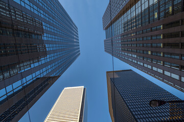 Fototapeta na wymiar Looking up at office towers in the financial district of Toronto Canada.