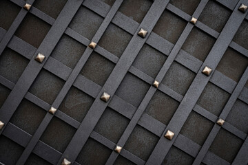 Decorating metal gates with forged elements. Fence of private property, protection