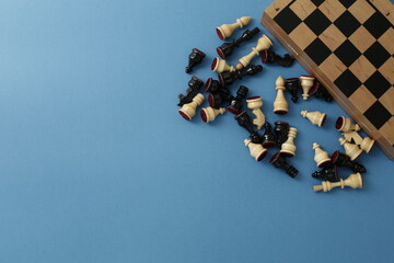 Chess pieces and board on a blue background