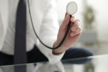 Doctor holding a stethoscope in his hand