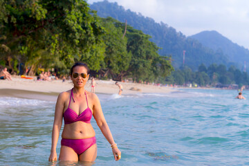 Obraz premium Woman shape sexy with bikini at beach