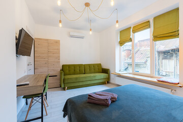 Interior photography, small stylish smart apartment, with modern renovation in loft style, living room