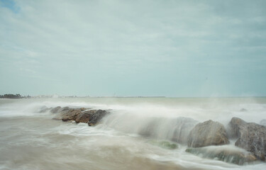 waves crashing on rocks