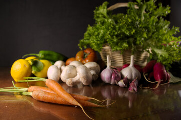 Still life of vegetables on a table with copy space and dark background