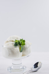 Ice-cream sundae, refreshing vanilla dessert. Holiday, vacation, summer delicious refreshing treats