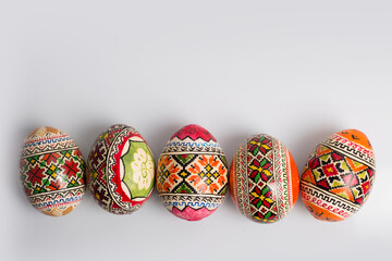 Easter eggs on a white background, greeting card for the holiday