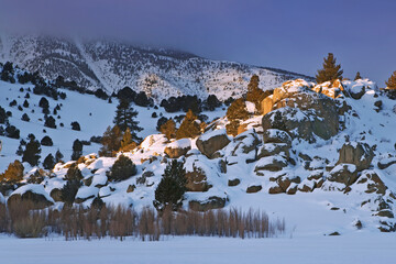 USA, California, Mammoth Lakes. Snow-covered mountain and valley.