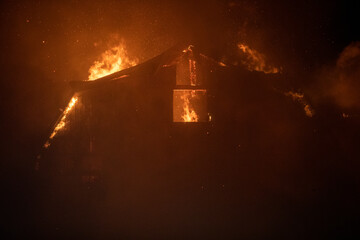 Blazing fire barn.