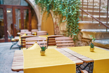 The wooden table in sidewalk cafe.