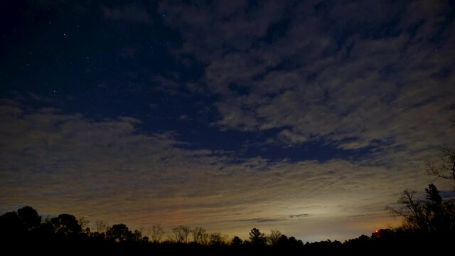 Stars rising in Mount Gilead, clouds disappearing from sky, timelapse