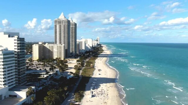 People On Sandy Beachfront In Island City Resort In Mid-Beach Area In Miami Beach, Florida, USA. - Time Lapse