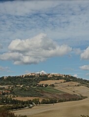 Fototapeta na wymiar Tuscany, Italy. Medieval town perched on the top of the hill. 