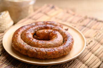 Northern Thai sausage (Sai Aua), Grilled intestine stuffed with minced pork, spices and herbs, popular food in Chiangmai, Thailand