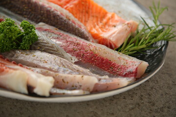 Seasoned seafood with fresh octopus, salmon, tuna and flatfish in one plate. 싱싱한 문어,...